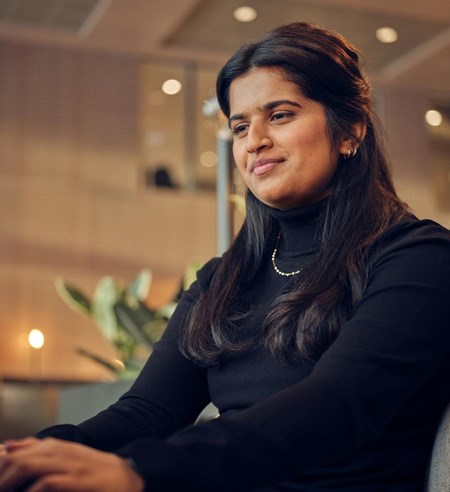 woman working on laptop smiling portrait